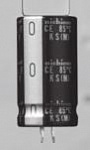 Электролитический конденсатор выводной, Ø35x45 мм, 4700 мкФ ±20%, 100 В, 1 000 ч, миниатюрные, с жесткими выводами